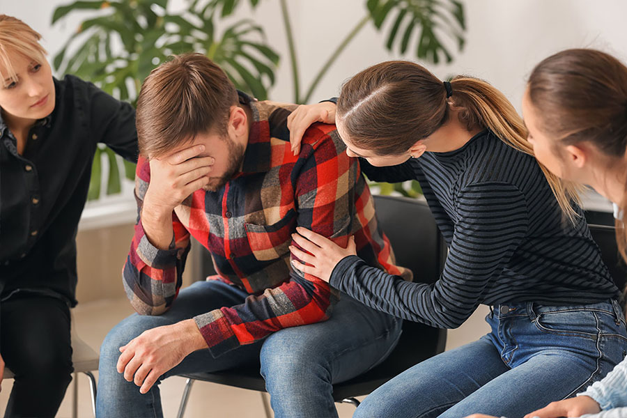 Therapist with great experience in the mental health field guiding the members during the family therapy session Therapist with great experience in the mental health field guiding the members during the family therapy session