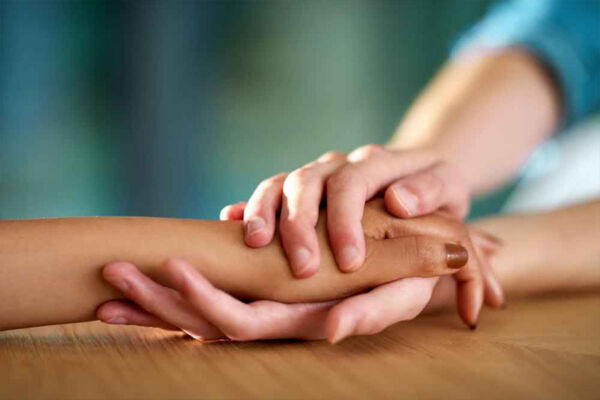 Hands touching concept image for emphatetic understanding