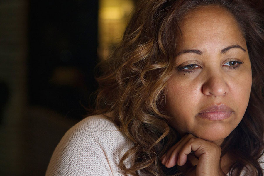 Lonely woman having difficulty forming relationships and seeking healing from relationship trauma Lonely woman having difficulty forming relationships and seeking healing from relationship trauma