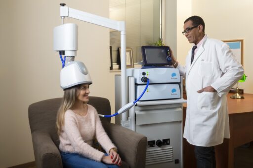 TMS for OCD women smiling while getting TMS treatment