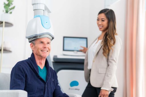 man smiling with getting TMS treatment in phoenix
