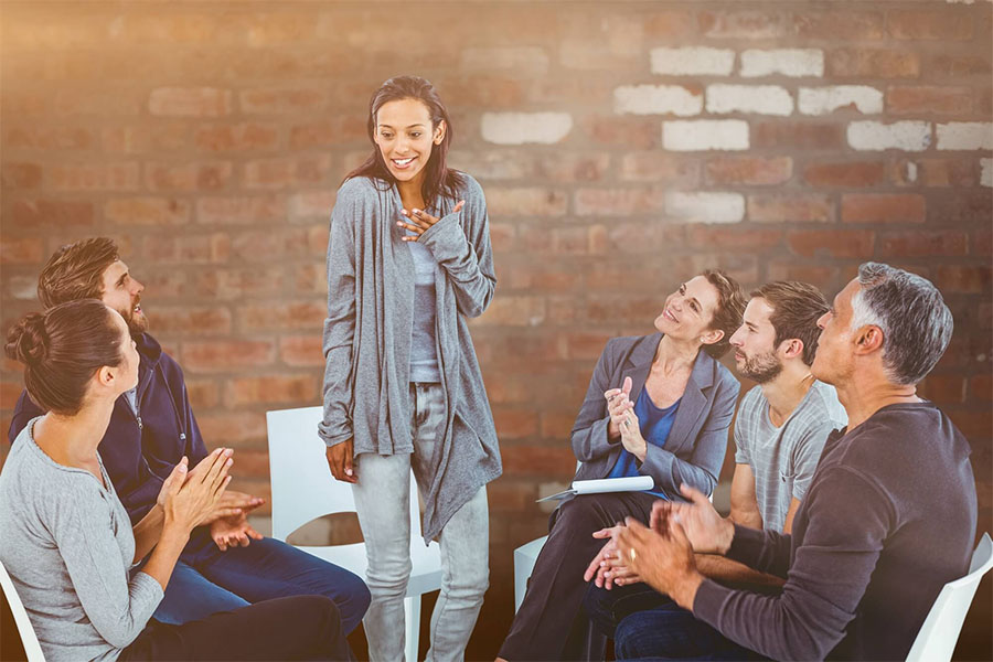 Young female sharing during support groups concept image for group therapy for addiction Young female sharing during support groups concept image for group therapy for addiction