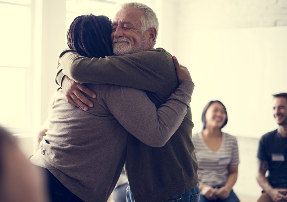 couple hugging concept image of drug relapse prevention